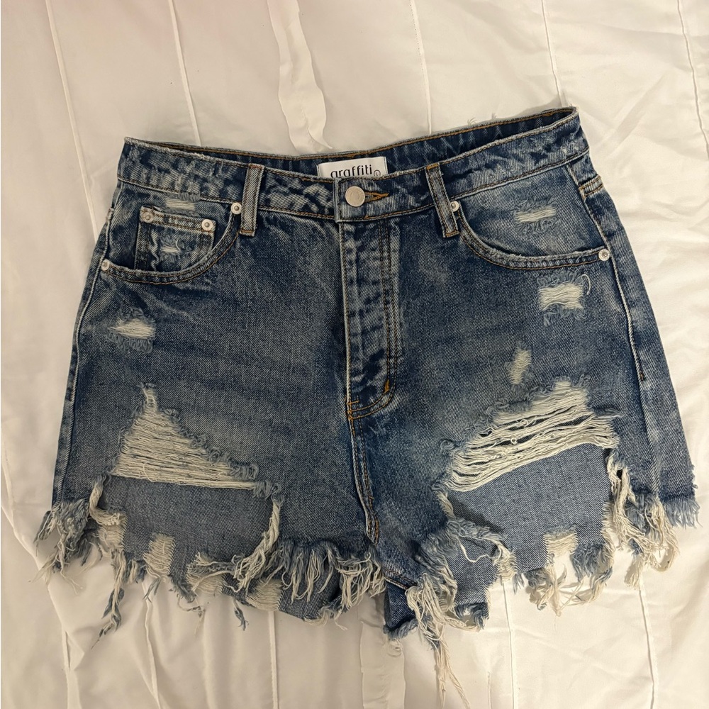 Super distressed denim shorts